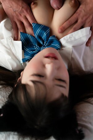 Bonny japanese girl Ria Kurumi hither tutor uniform coupled with shaved pussy gets titjob fucked